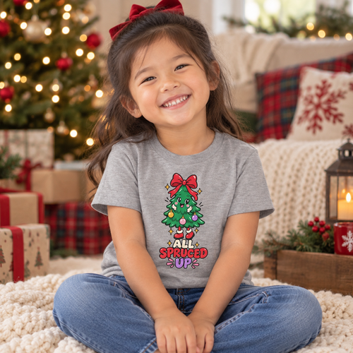 Girl wearing All Spruced Up Christmas toddler tee