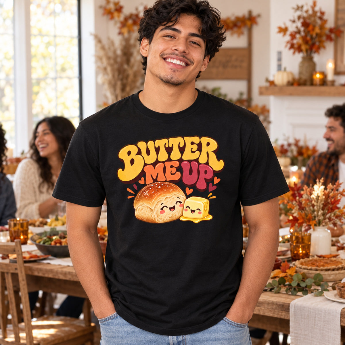 Man wearing Butter Me Up black adult tee at a Friendsgiving gathering